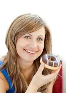 Woman Eating Donut