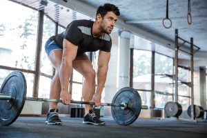 Athlete lifting barbell
